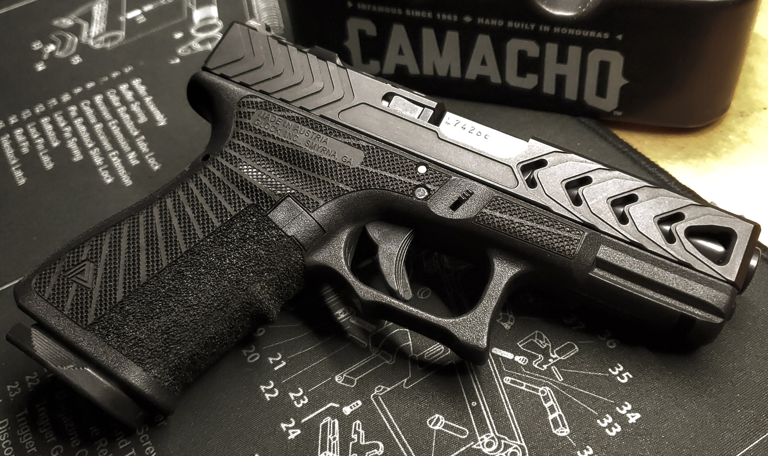 Customizing Your Glock: A Guide to Professional Laser Stippling Services